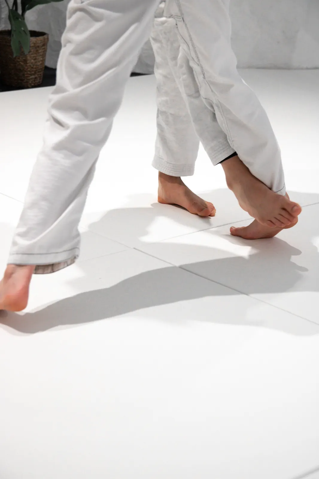 Barefoot on the white mat
